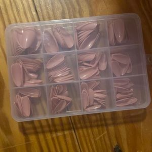 Pack of pink almond nails